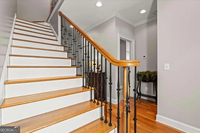 a view of a deck with table and chairs and wooden floor