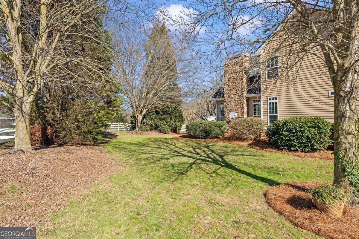 220 McKenzie Bridge Road Carrollton, GA 30117 - Photo 69 of 80 a view of backyard of house