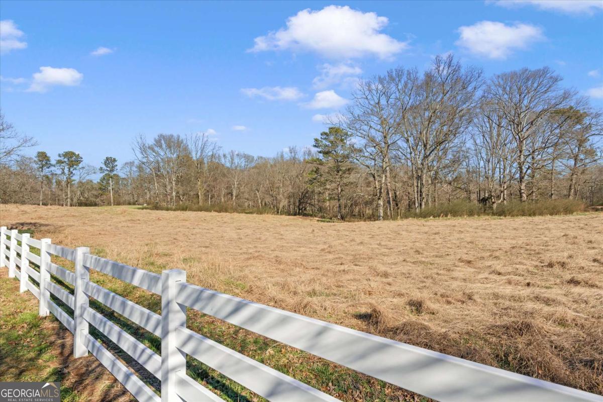 220 McKenzie Bridge Road Carrollton, GA 30117 - Photo 72 of 80 a view of yard covered with snow