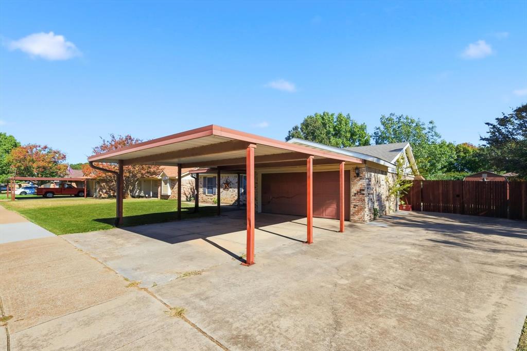 425 Ridgecrest Drive Saginaw, TX 76179 - Photo 2 of 27 a view of house with yard and entertaining space
