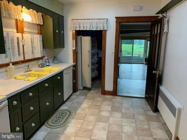 a bathroom with a sink a vanity and a mirror