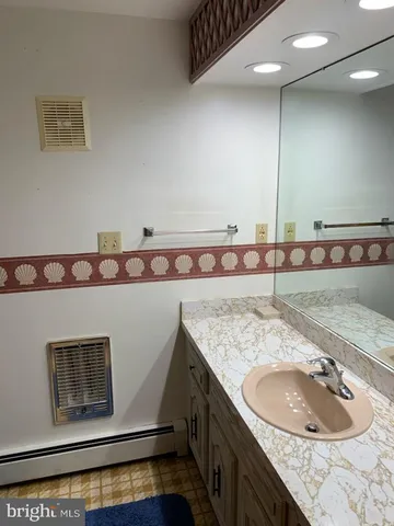 a bathroom with a sink and a toilet