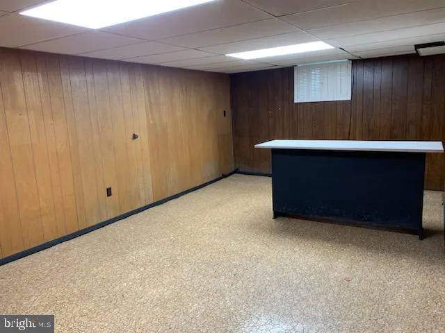 a room with a desk and closet