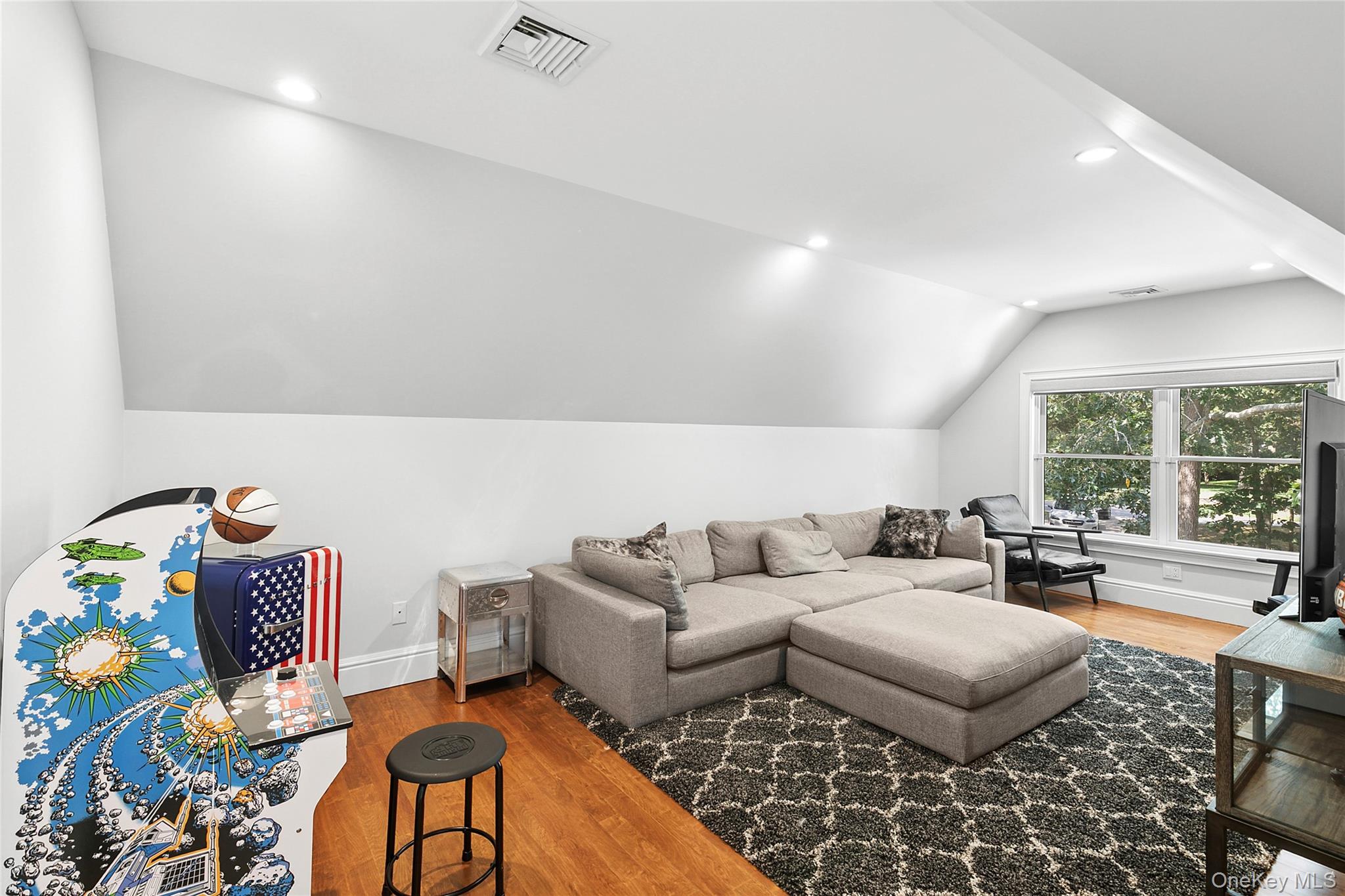 3470 North Bayview Road Southold, NY 11971 - Photo 12 of 25 Bedroom used as bonus featuring light wood finished floors, lofted ceiling, and recessed lighting
