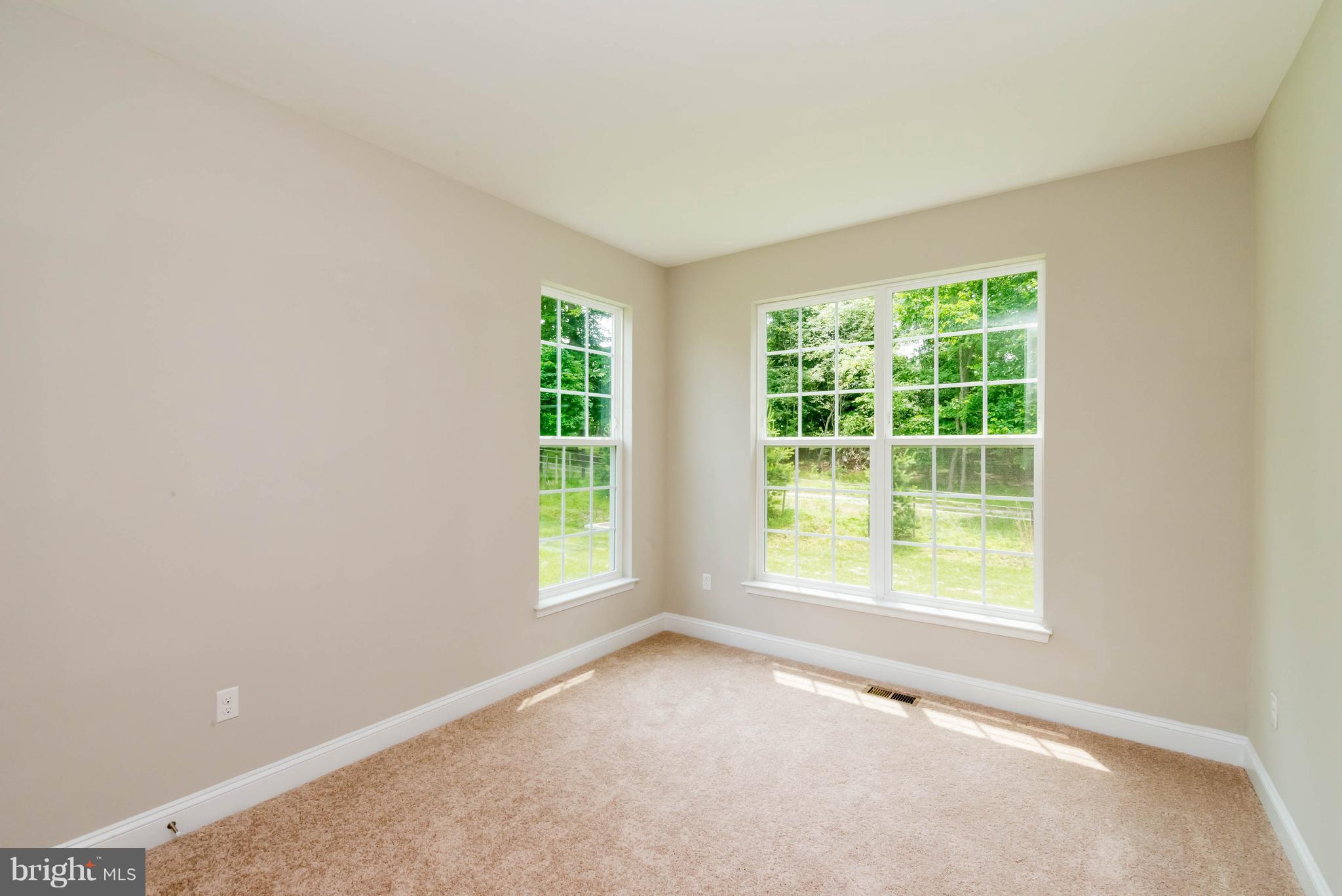 4229 Perry Hall Road Perry Hall, MD 21128 - Photo 12 of 30 an empty room with windows