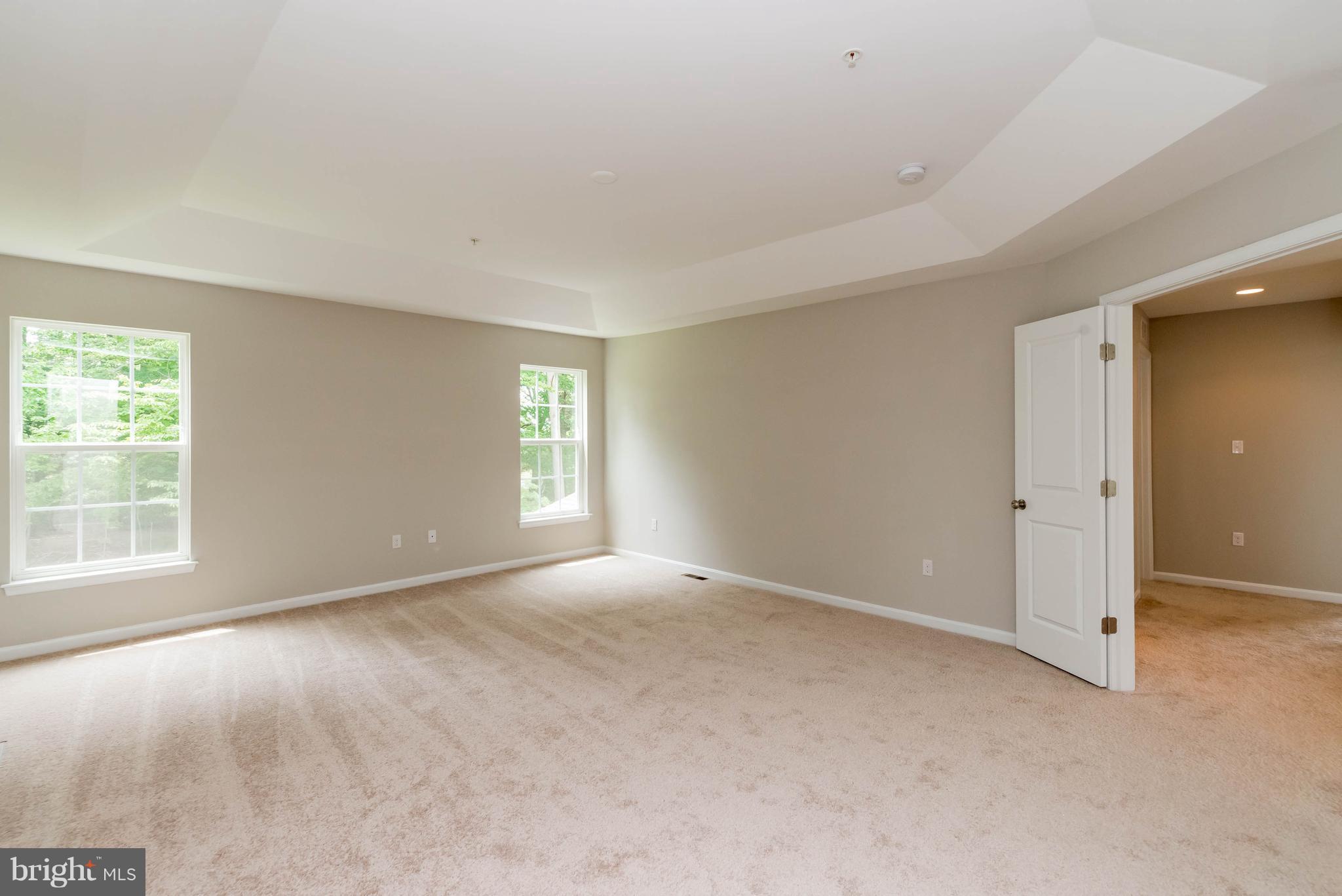 4229 Perry Hall Road Perry Hall, MD 21128 - Photo 14 of 30 an empty room with windows and closet