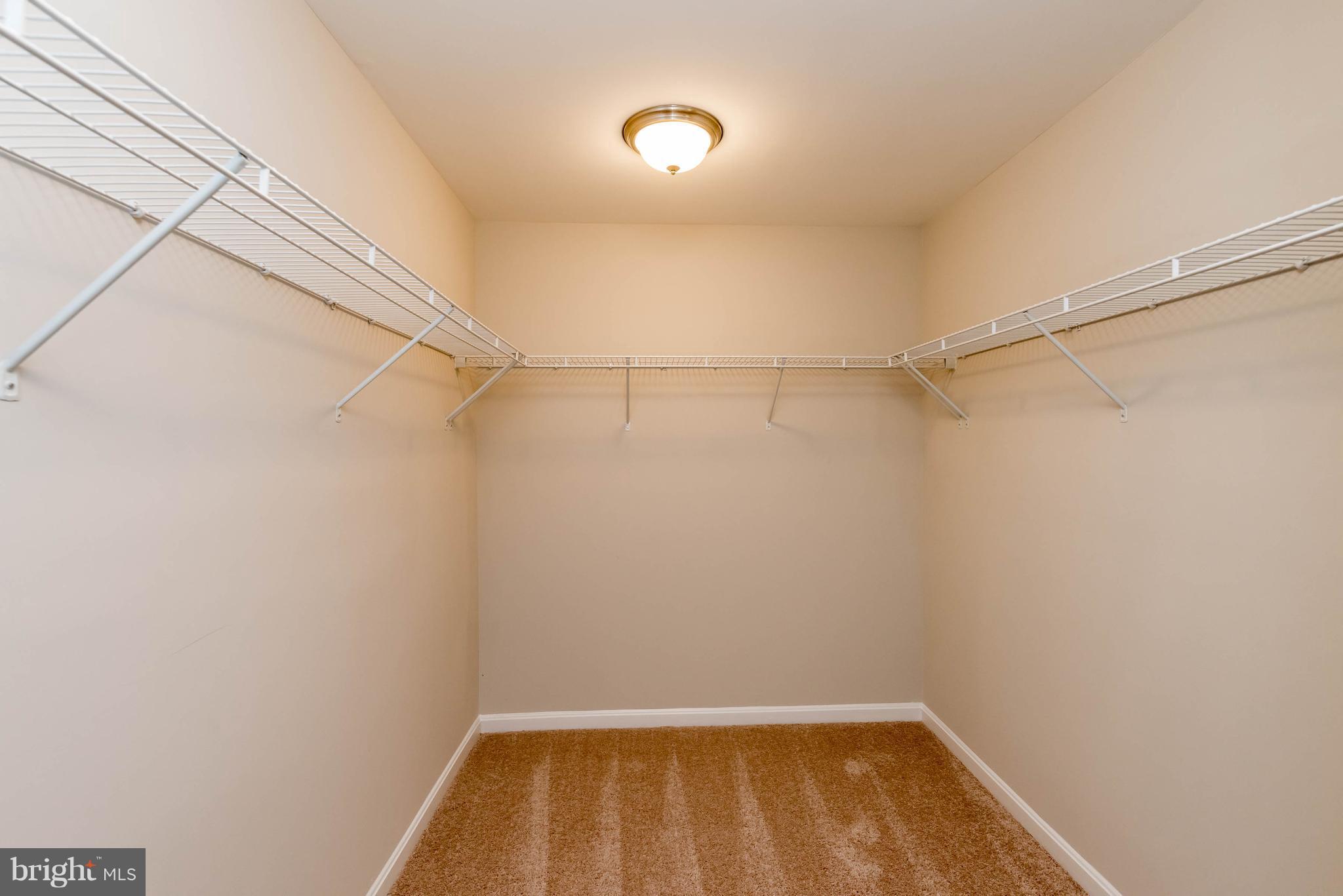 4229 Perry Hall Road Perry Hall, MD 21128 - Photo 16 of 30 a view of a room with racks on the wall