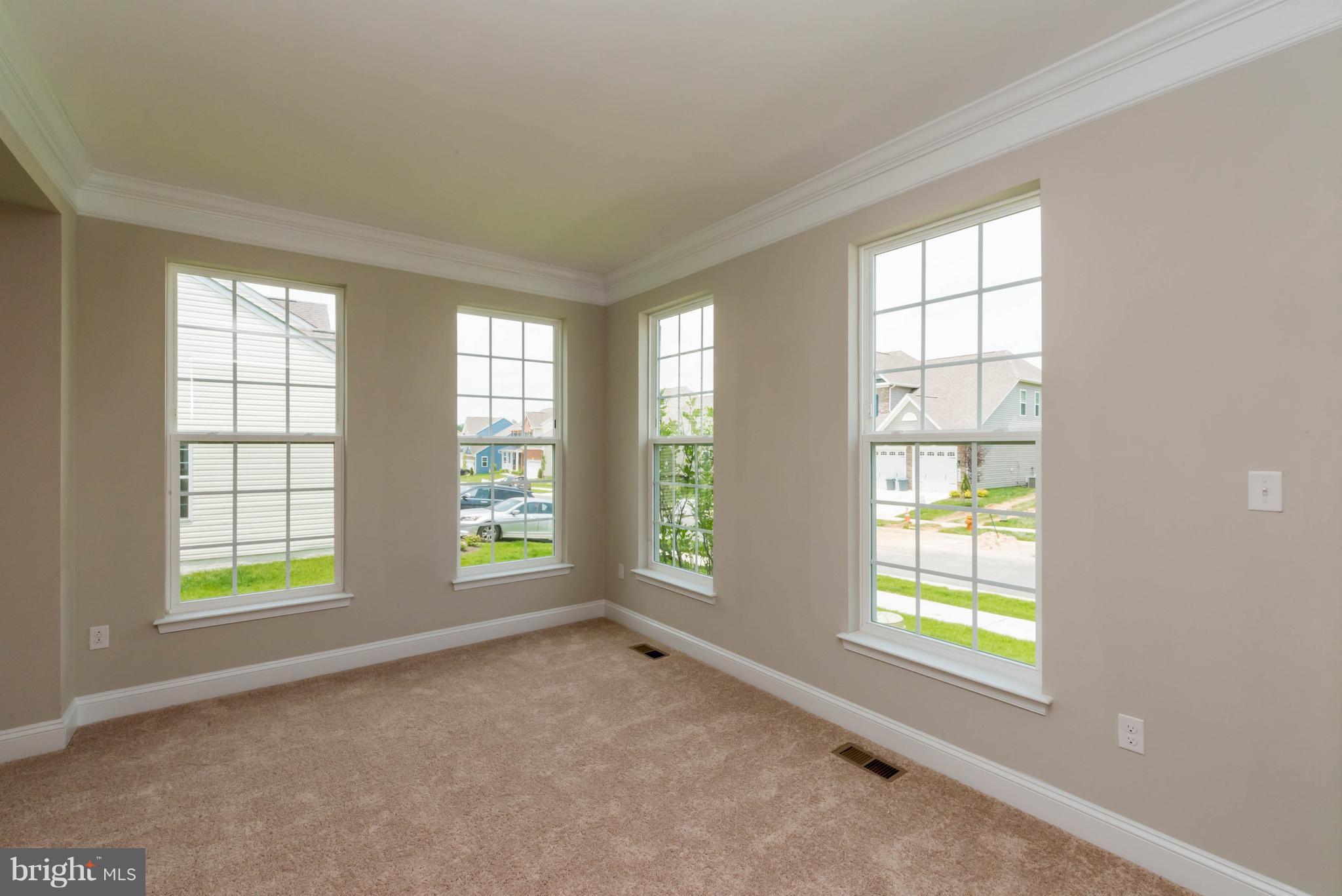 4229 Perry Hall Road Perry Hall, MD 21128 - Photo 3 of 30 an empty room with windows