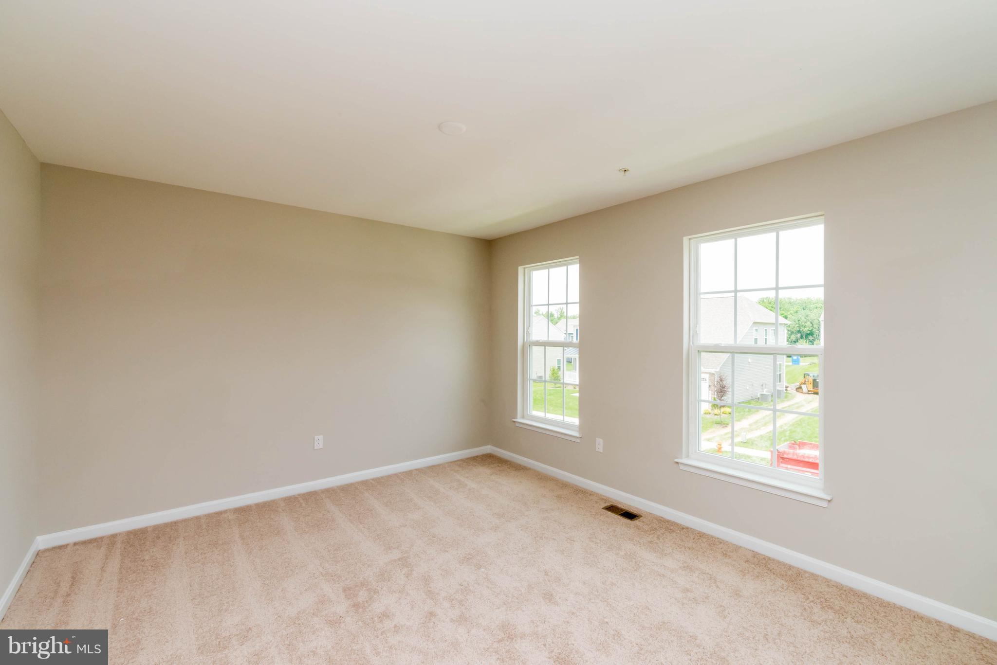 4229 Perry Hall Road Perry Hall, MD 21128 - Photo 23 of 30 a view of an empty room with a window