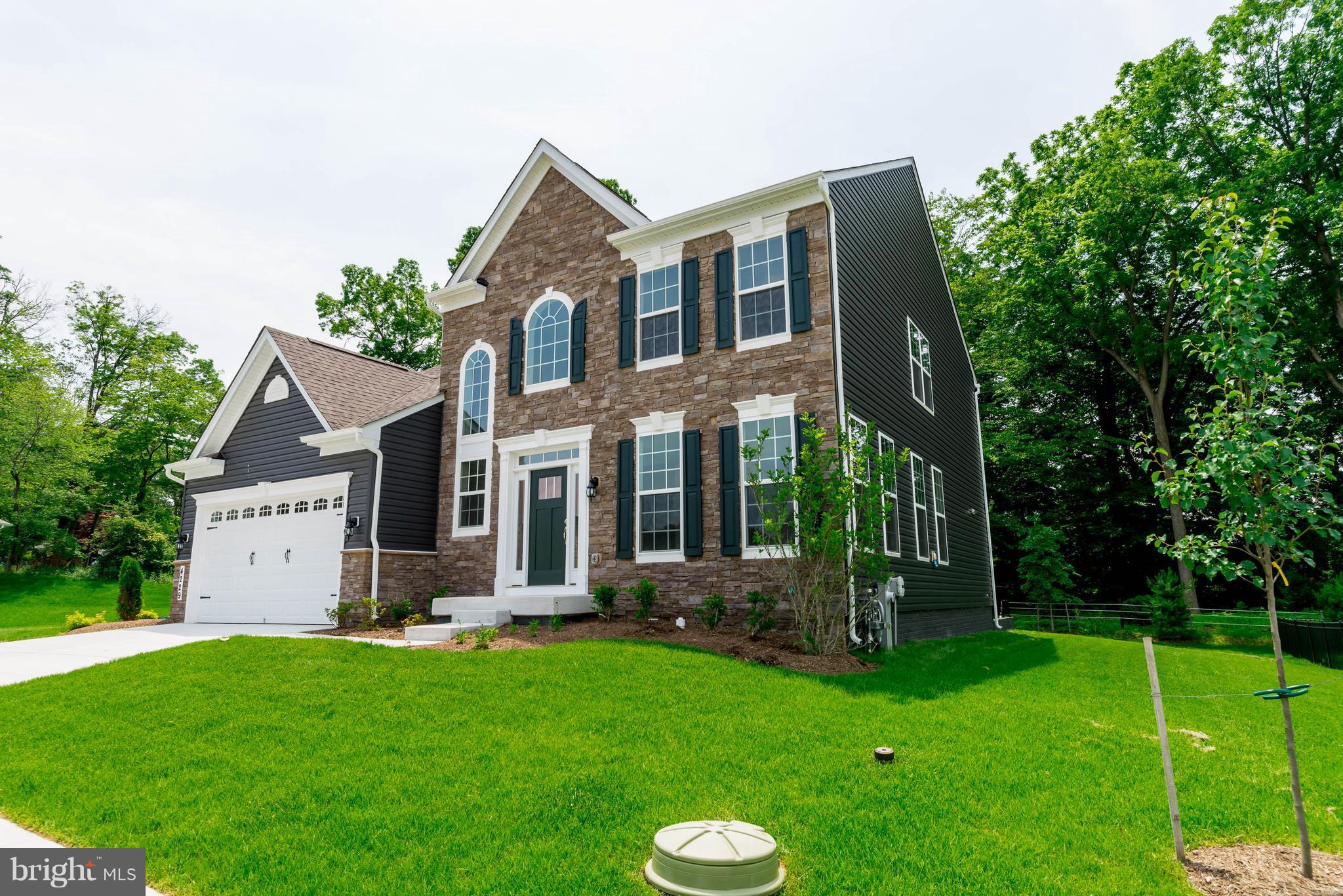 4229 Perry Hall Road Perry Hall, MD 21128 - Photo 27 of 30 a front view of a house with a yard