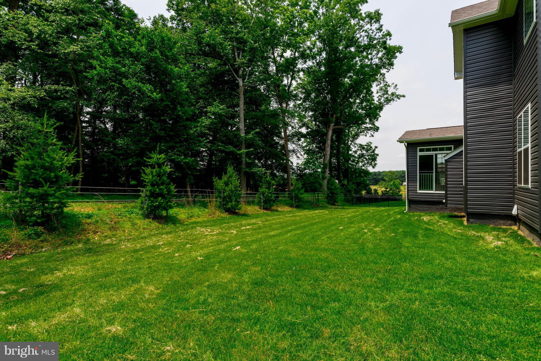 4229 Perry Hall Road Perry Hall, MD 21128 - Photo 30 of 30 a view of a house with a backyard