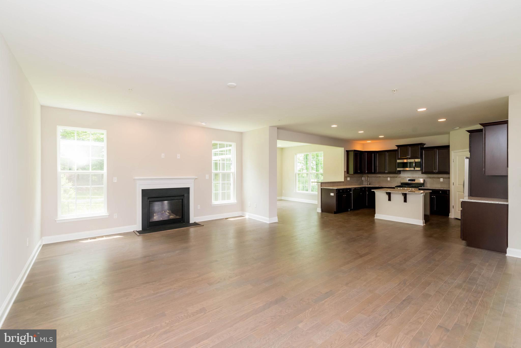4229 Perry Hall Road Perry Hall, MD 21128 - Photo 6 of 30 a view of kitchen with furniture and wooden floor
