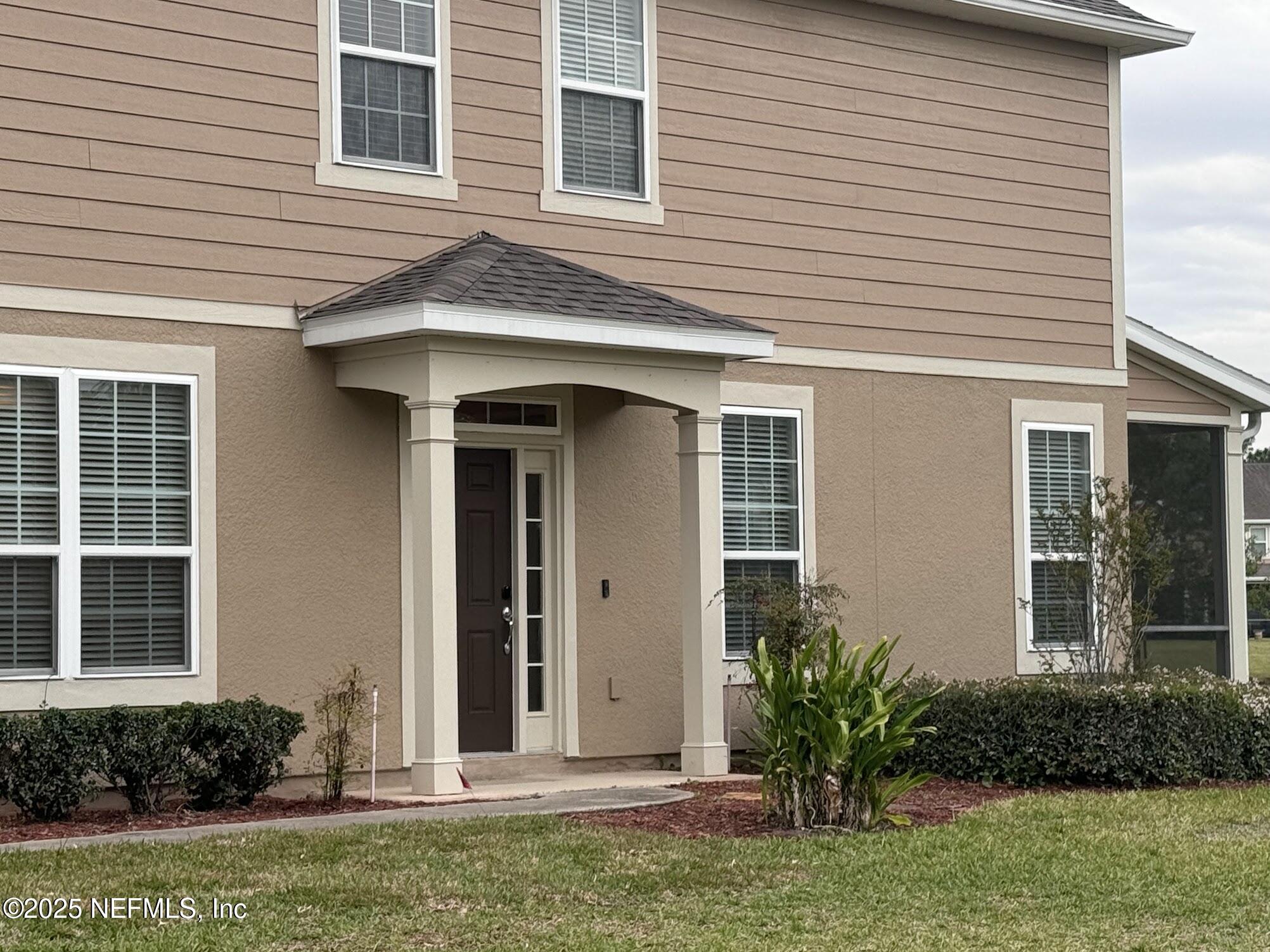 6772 Roundleaf Drive Jacksonville, FL 32258 - Photo 3 of 32 Roundleaf Side Entrance