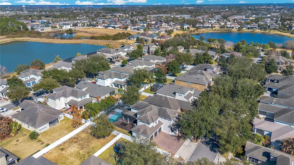 13263 Strode Lane Windermere, FL 34786 - Photo 6 of 53 an aerial view of ocean and residential houses with outdoor space