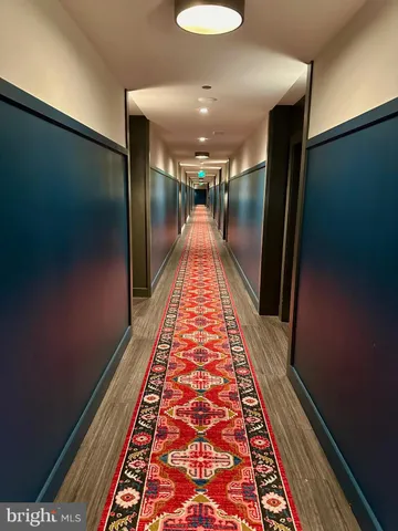 a kitchen with stainless steel appliances a stove sink and refrigerator