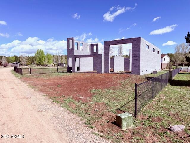 17795 Hopi Road, Unit 51 Munds Park, AZ 86017 - Photo 5 of 58 a swimming pool with outdoor seating and yard