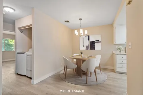 a view of a dining room with furniture
