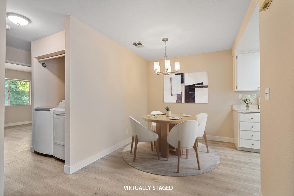 331 Shadow Run Drive San Jose, CA 95110 - Photo 4 of 25 a view of a dining room with furniture