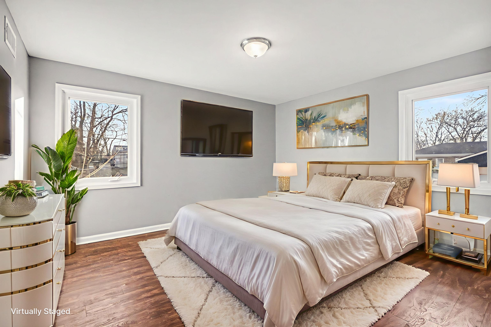 2817 173rd Street Hazel Crest, IL 60429 - Photo 11 of 23 a bedroom with a bed and a painting on the wall