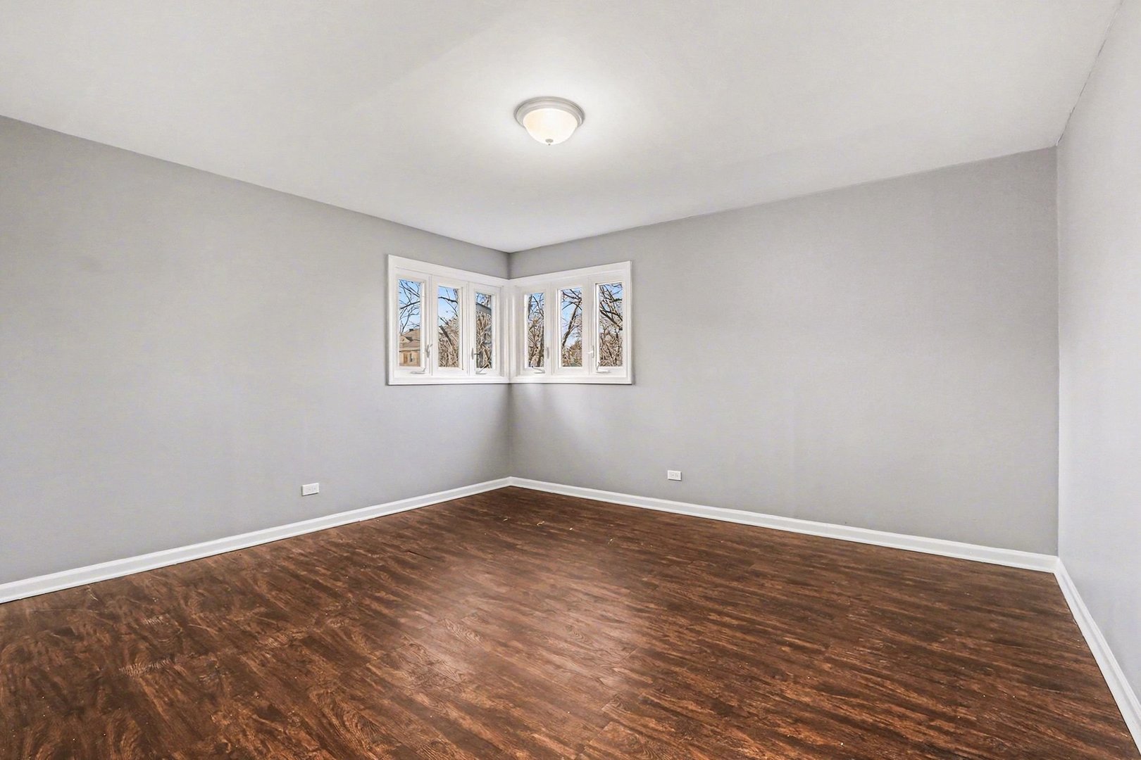 2817 173rd Street Hazel Crest, IL 60429 - Photo 15 of 23 a view of empty room with wooden floor and fan