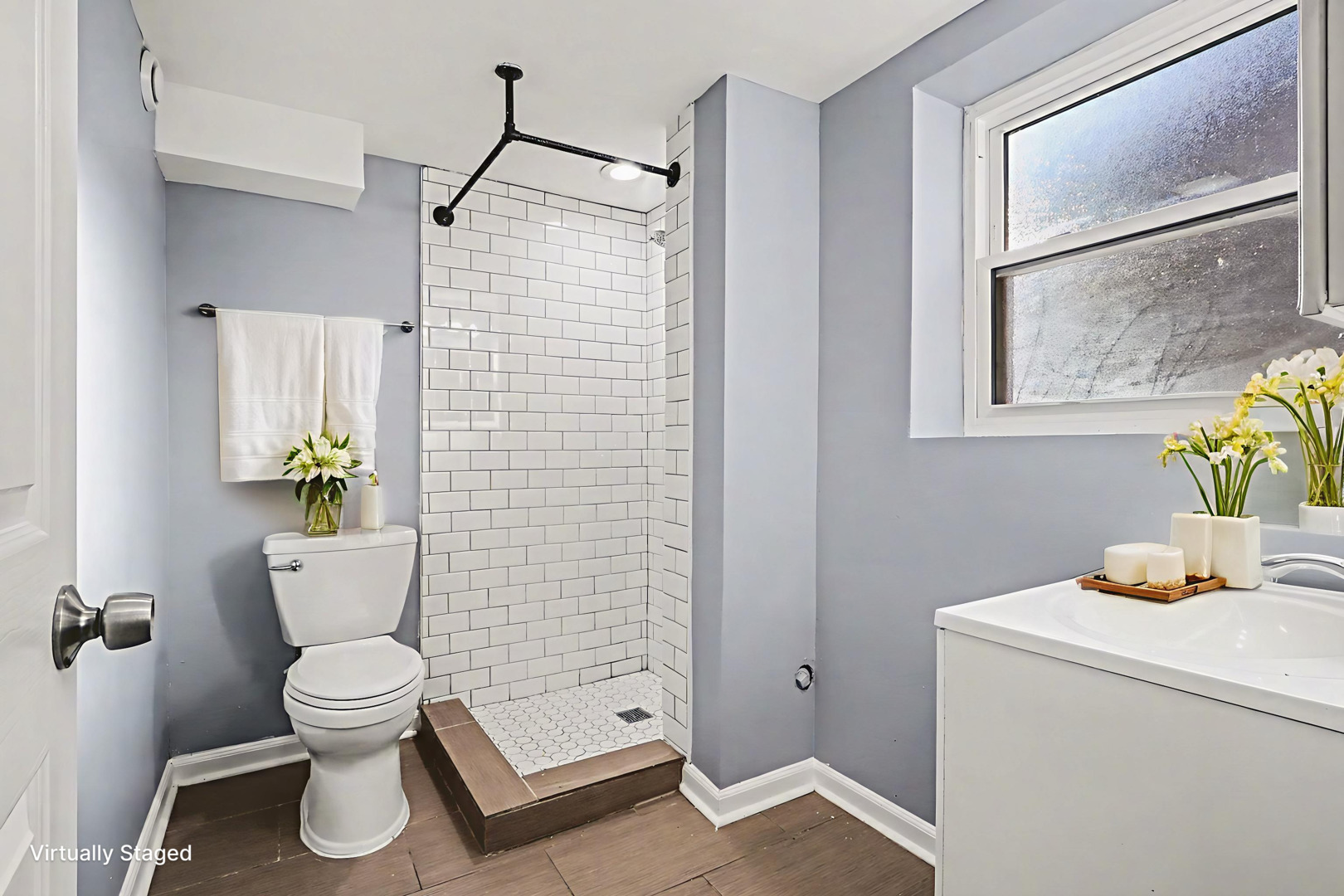 2817 173rd Street Hazel Crest, IL 60429 - Photo 17 of 23 a bathroom with a toilet sink and shower