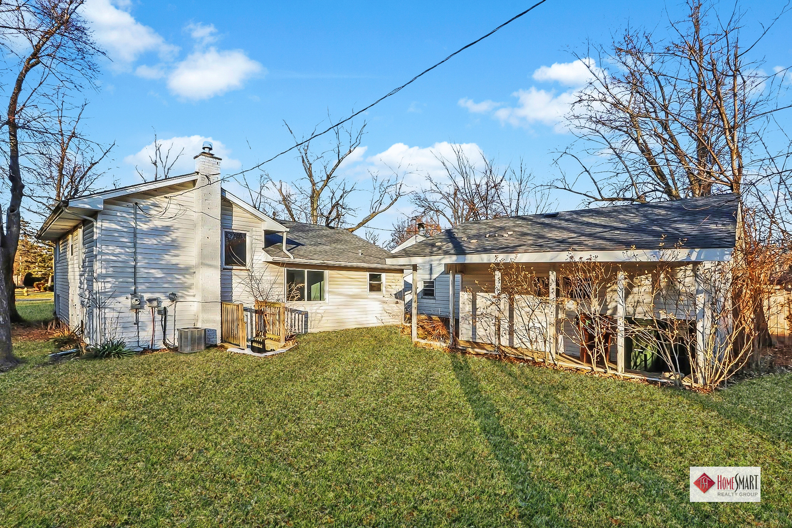 2817 173rd Street Hazel Crest, IL 60429 - Photo 21 of 23 a view of a house with a yard