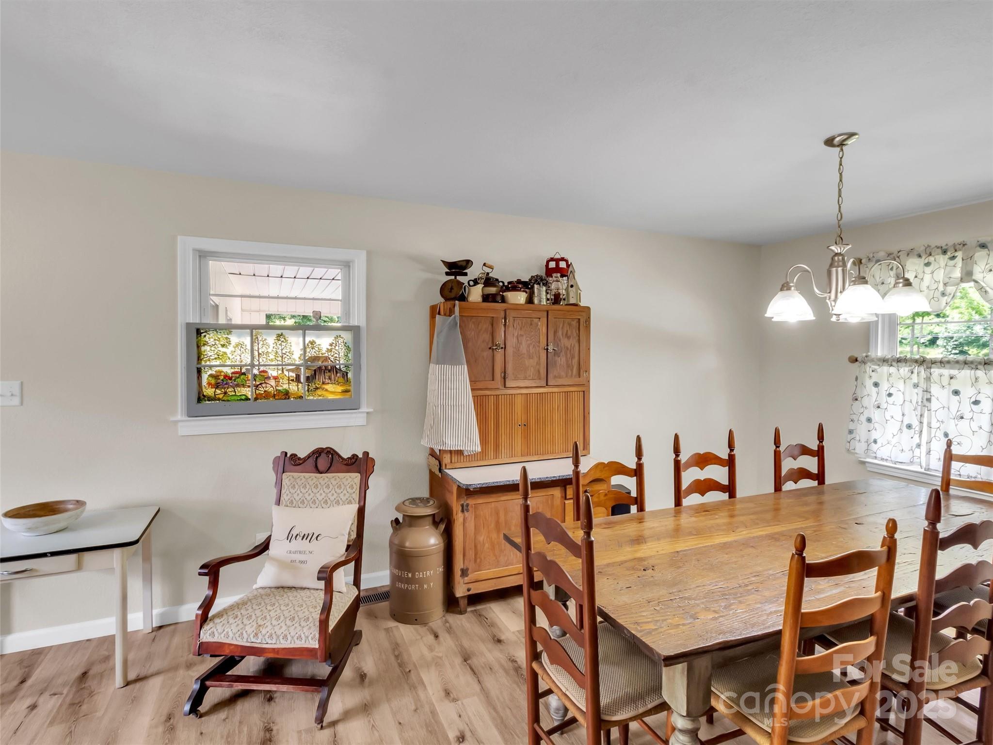 463 Golf Course Road Clyde, NC 28721 - Photo 8 of 41 a dining room with furniture and window