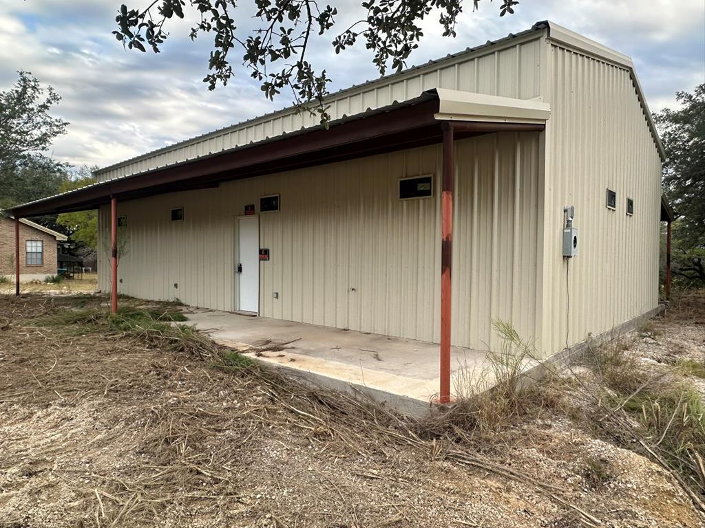 a house with trees in the background
