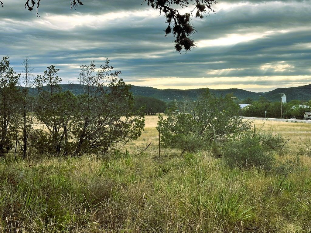 52 Timbers Drive Leakey, TX 78873 - Photo 12 of 28 a view of a lake from a yard