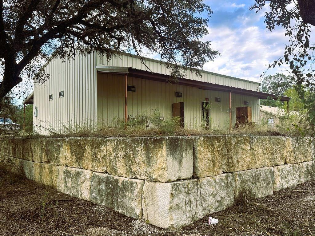52 Timbers Drive Leakey, TX 78873 - Photo 3 of 28 a view of a small house with a large window