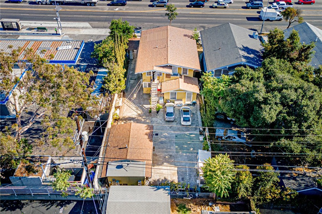 1929 Crenshaw Boulevard Los Angeles, CA 90016 - Photo 4 of 13 an aerial view of multiple houses with outdoor space