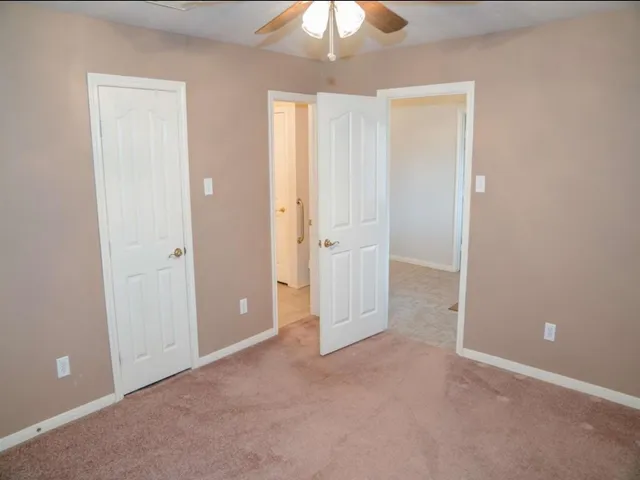 an empty room with a bathroom