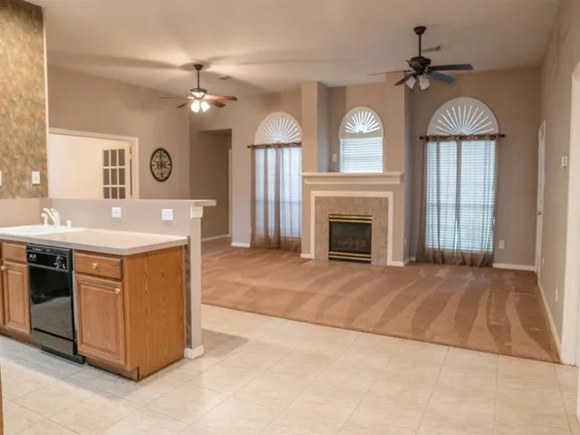 a kitchen with a stove and a sink