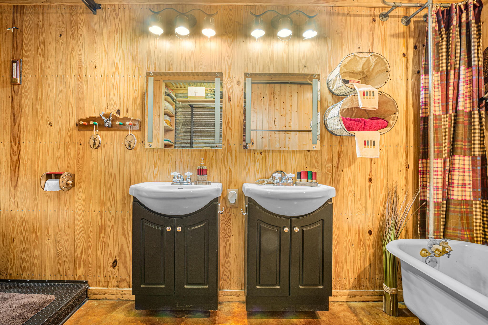5263 Coy Burgess Loop DeFuniak Springs, FL 32435 - Photo 19 of 57 a bathroom with a sink mirror and tub