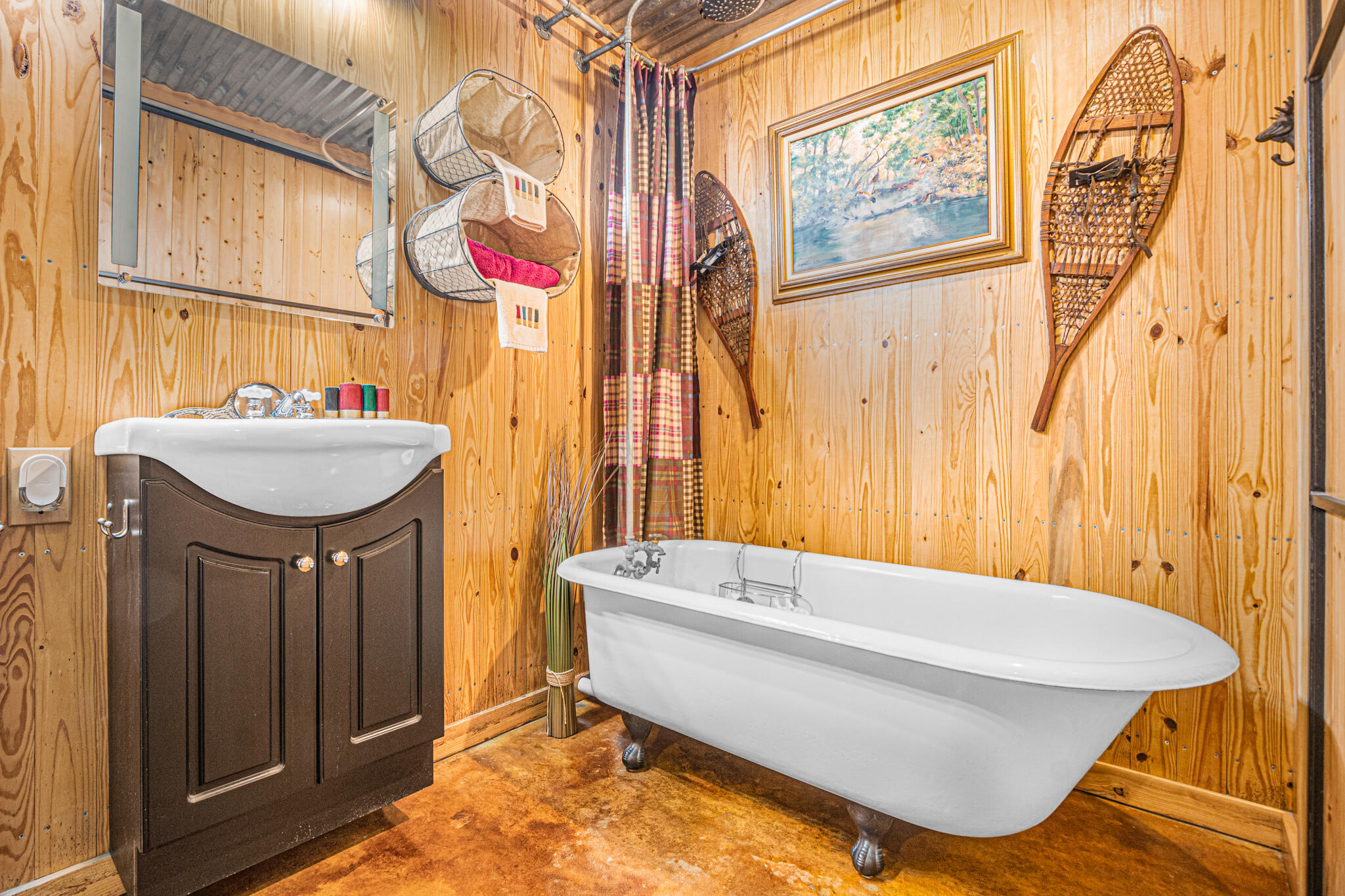5263 Coy Burgess Loop DeFuniak Springs, FL 32435 - Photo 20 of 57 a bathroom with a tub sink and mirror