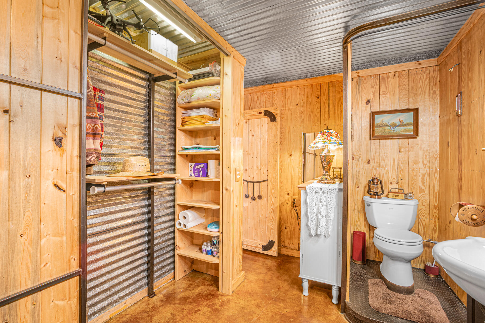5263 Coy Burgess Loop DeFuniak Springs, FL 32435 - Photo 21 of 57 a bathroom with a toilet and a shower