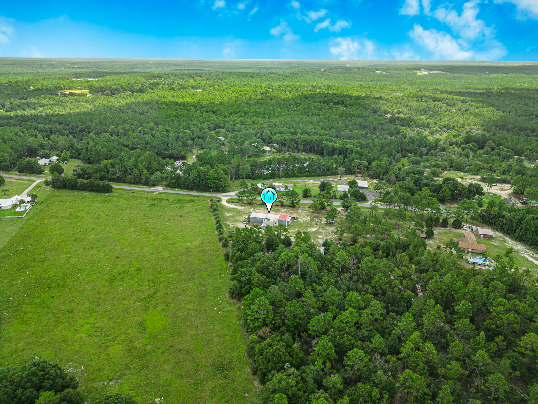 5263 Coy Burgess Loop DeFuniak Springs, FL 32435 - Photo 38 of 57 a view of yard with ocean view