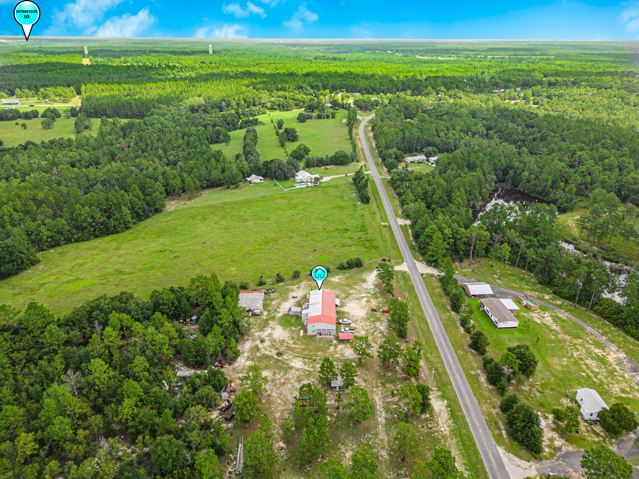 5263 Coy Burgess Loop DeFuniak Springs, FL 32435 - Photo 48 of 57 a view of a field with an ocean