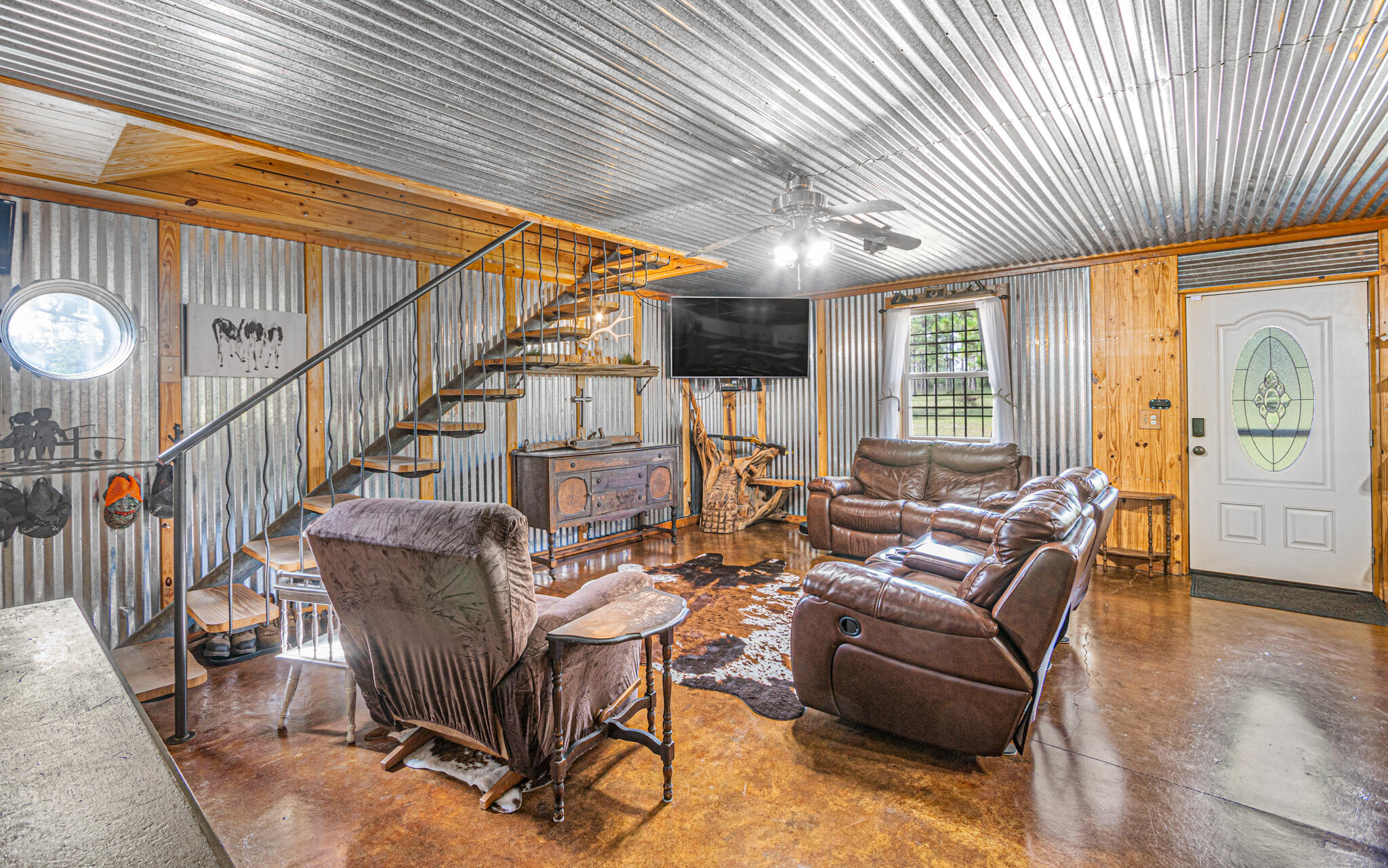 5263 Coy Burgess Loop DeFuniak Springs, FL 32435 - Photo 8 of 57 a living room with furniture or outdoor dining space with wooden floor
