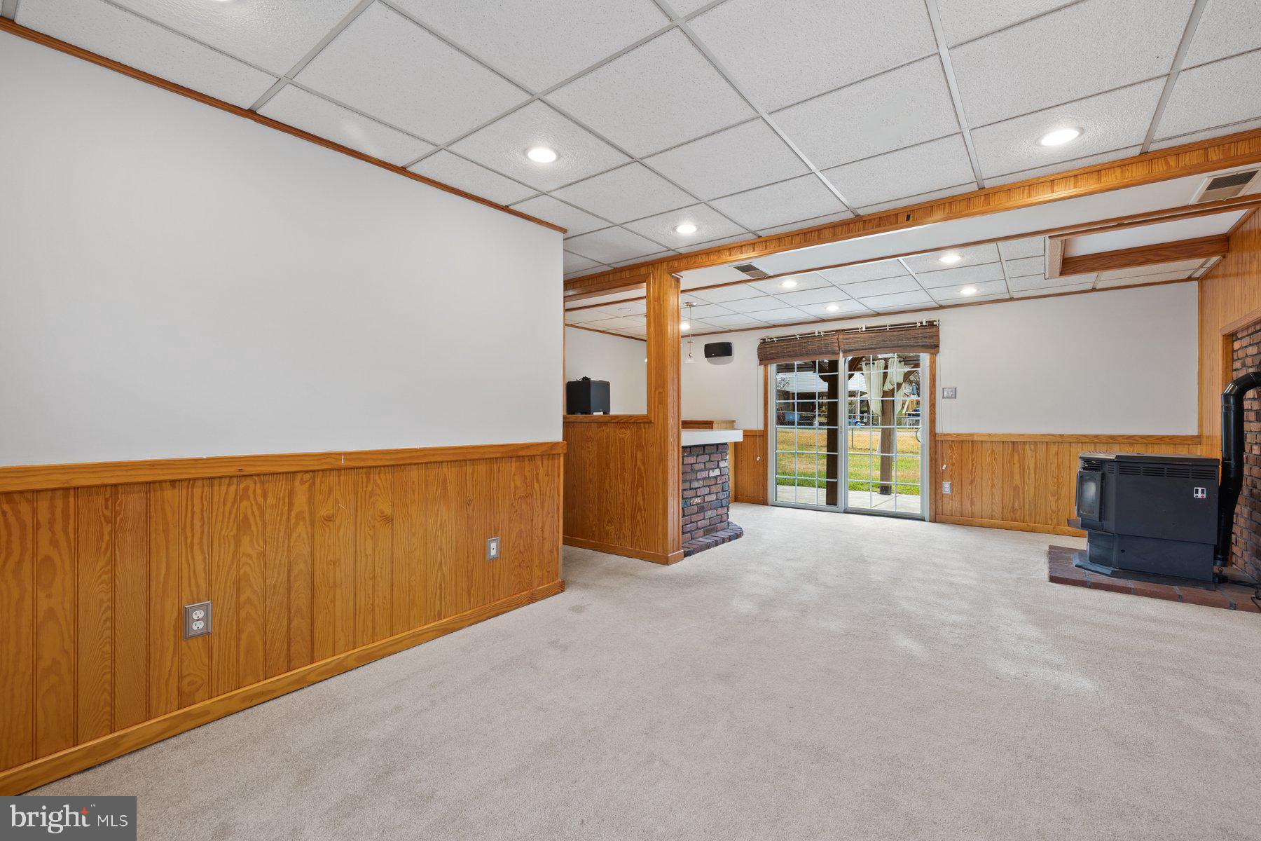 1302 Squire Lane Dunkirk, MD 20754 - Photo 16 of 31 a view of an empty room with wooden floor and a window