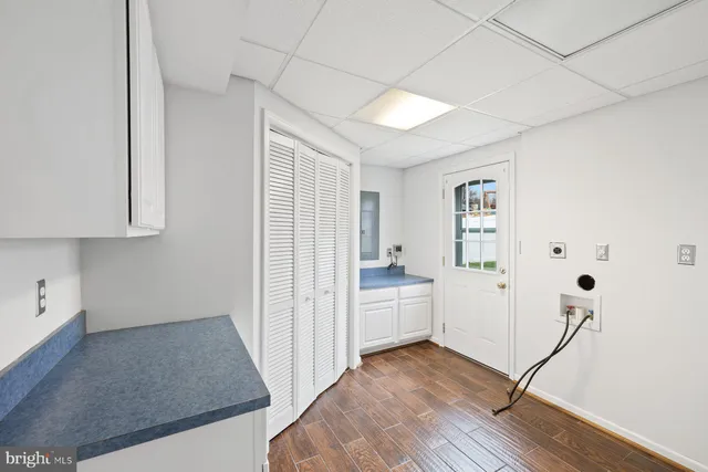 a view of hallway with wooden floor