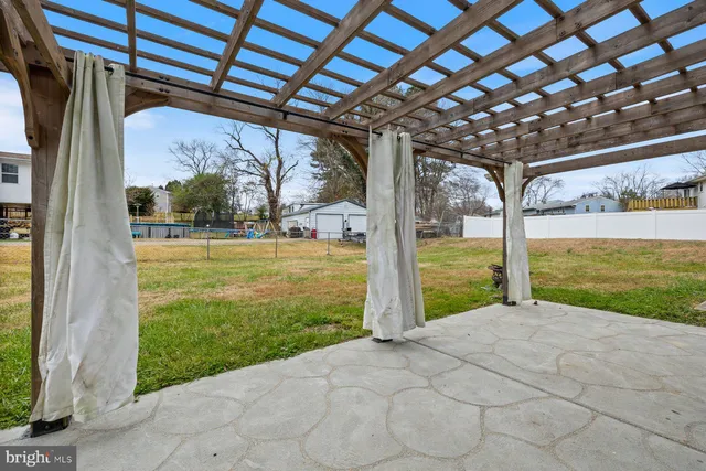 a view of a porch with a backyard