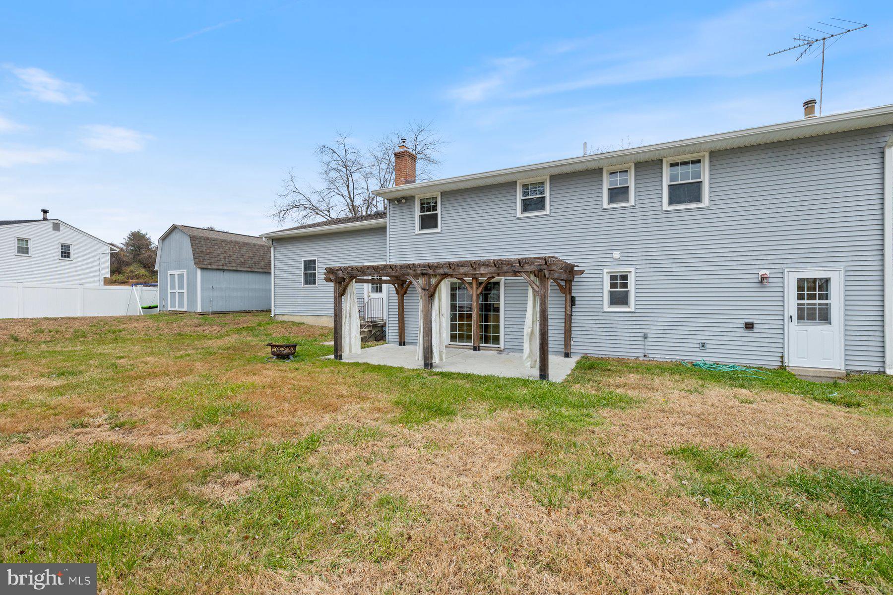 1302 Squire Lane Dunkirk, MD 20754 - Photo 28 of 31 a view of a house with backyard and sitting area