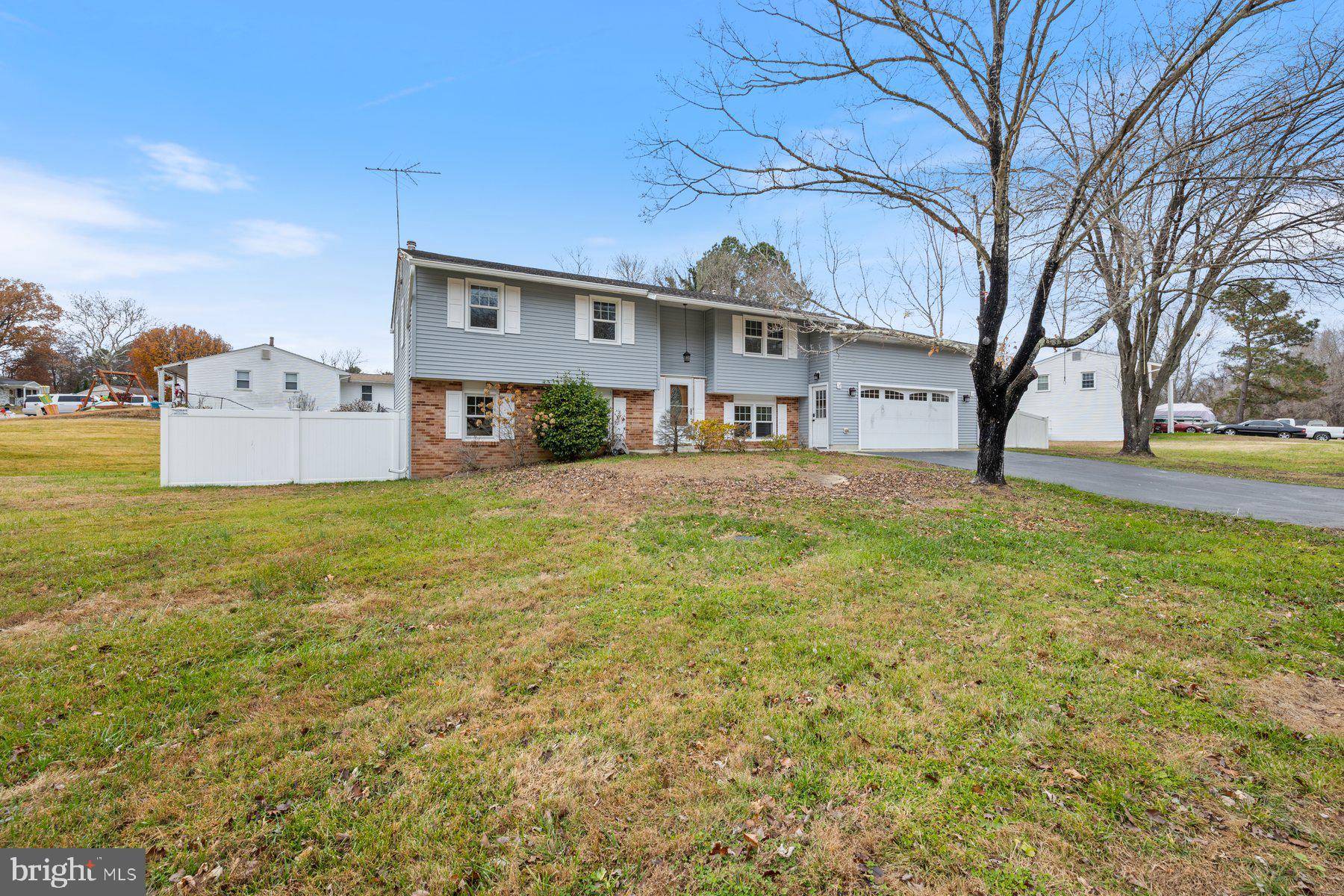 1302 Squire Lane Dunkirk, MD 20754 - Photo 31 of 31 a front view of a house with a yard