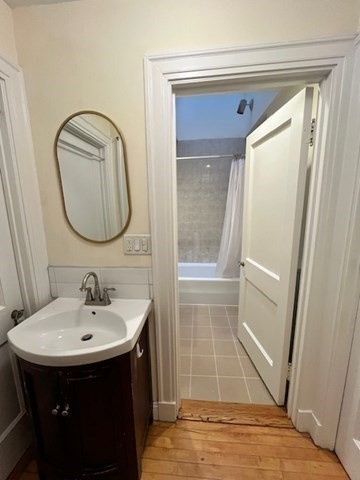 12 Aberdeen Street, Unit 2 Boston, MA 02215 - Photo 4 of 9 a bathroom with a sink and a mirror