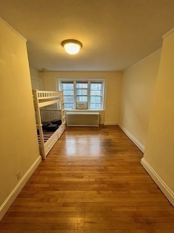 12 Aberdeen Street, Unit 2 Boston, MA 02215 - Photo 6 of 9 a view of a room with wooden floor and a window