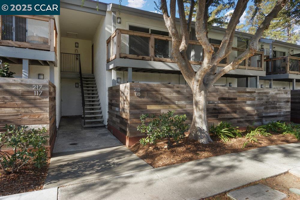 4081 Clayton Road, Unit 218 Concord, CA 94521 - Photo 1 of 26 a view of a house with a yard