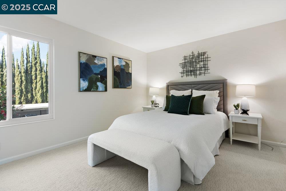 4081 Clayton Road, Unit 218 Concord, CA 94521 - Photo 11 of 26 a bedroom with a bed and window