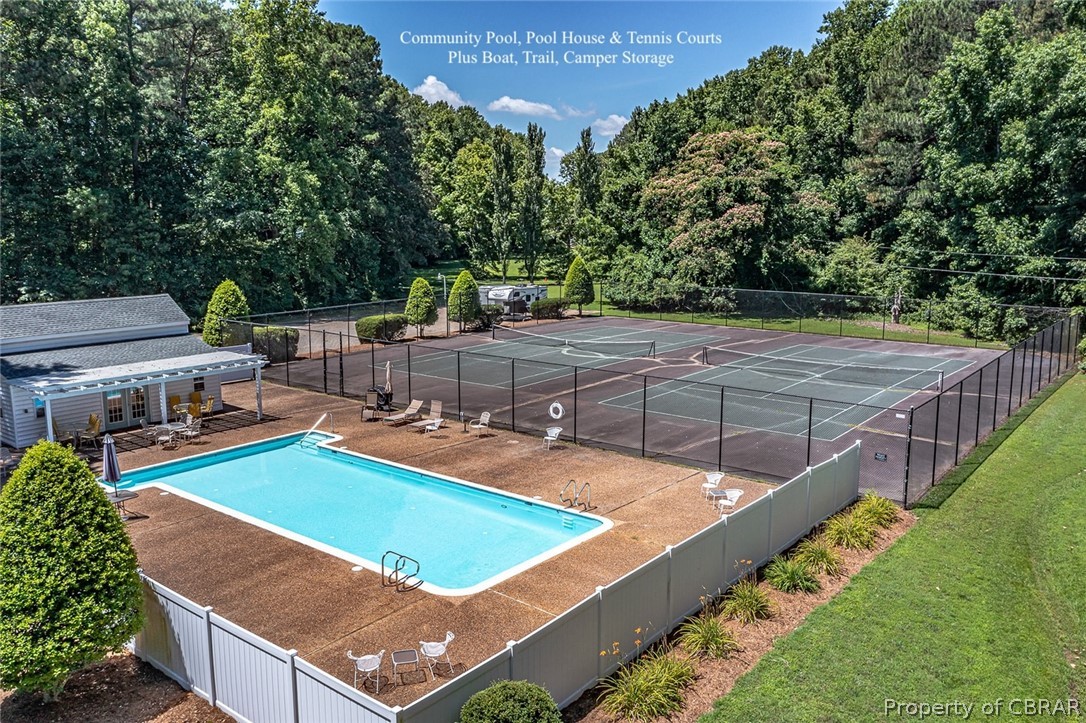 5818 Rivers Landing Terrace, Unit 5818 White Stone, VA 22578 - Photo 4 of 50 View of pool featuring tennis court