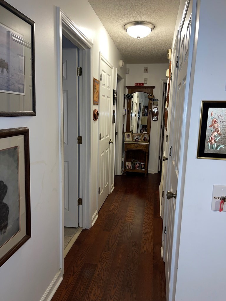 204 Crystal Springs Road Cleveland, TN 37323 - Photo 8 of 22 a view of hallway with stairs and wooden floor